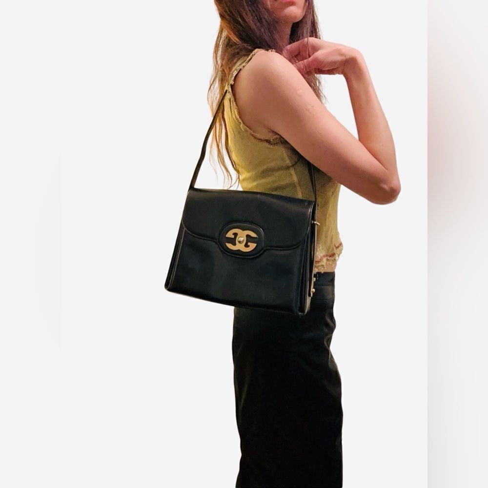 Gucci vintage gg gold logo shoulder and hand bag, strap is convertible